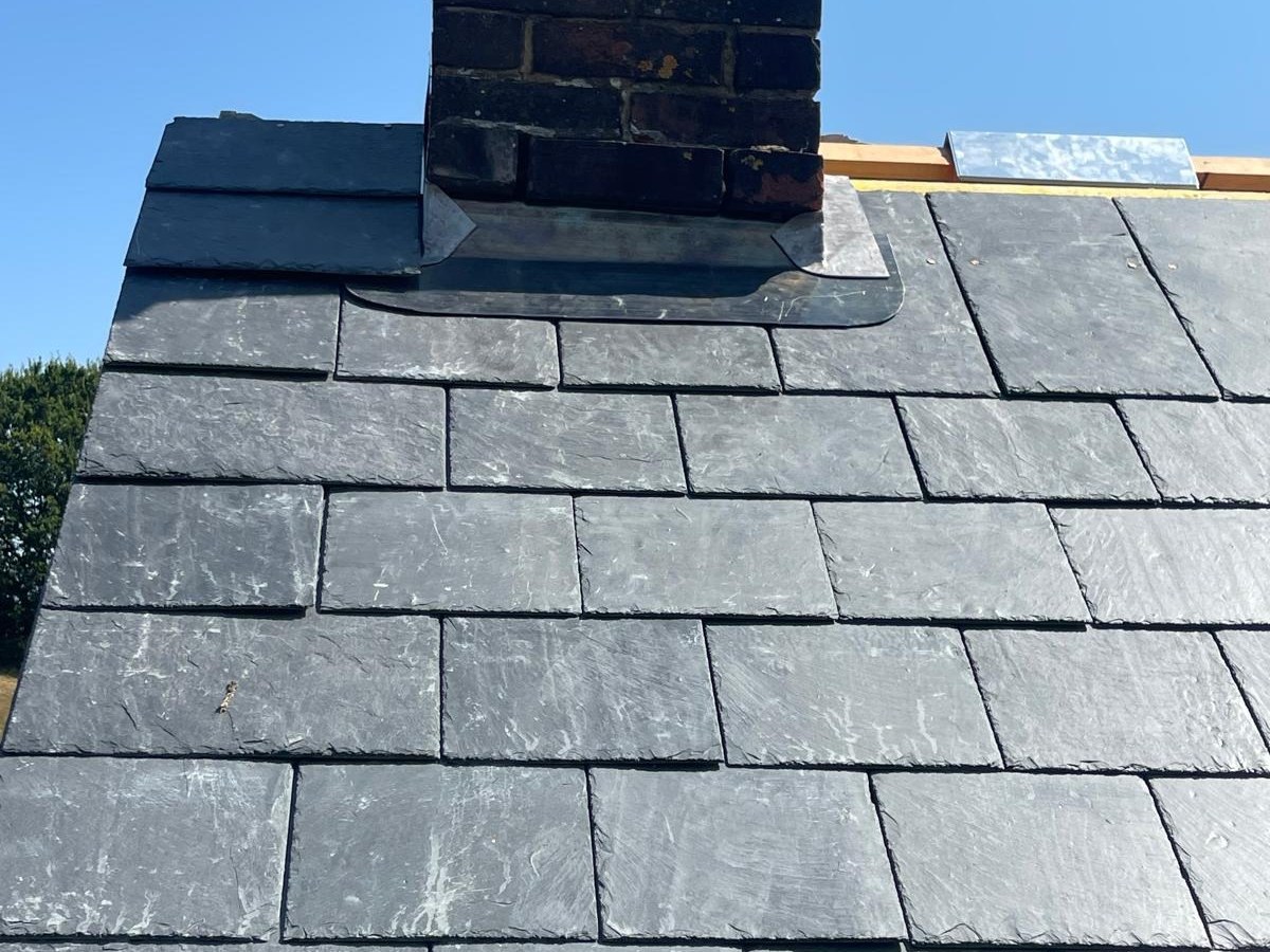 New lead flashing around a chimney stack by Harding & Co. Roofing Specialists in London and the South East — project 10