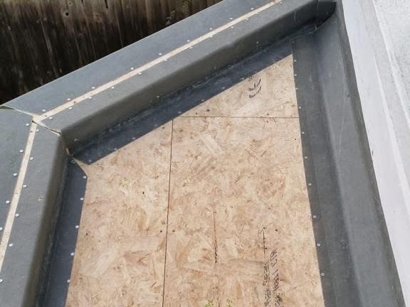 EPDM rubber flat roof installation in progress by Harding & Co. Roofing Specialists in London and the South East — project 1