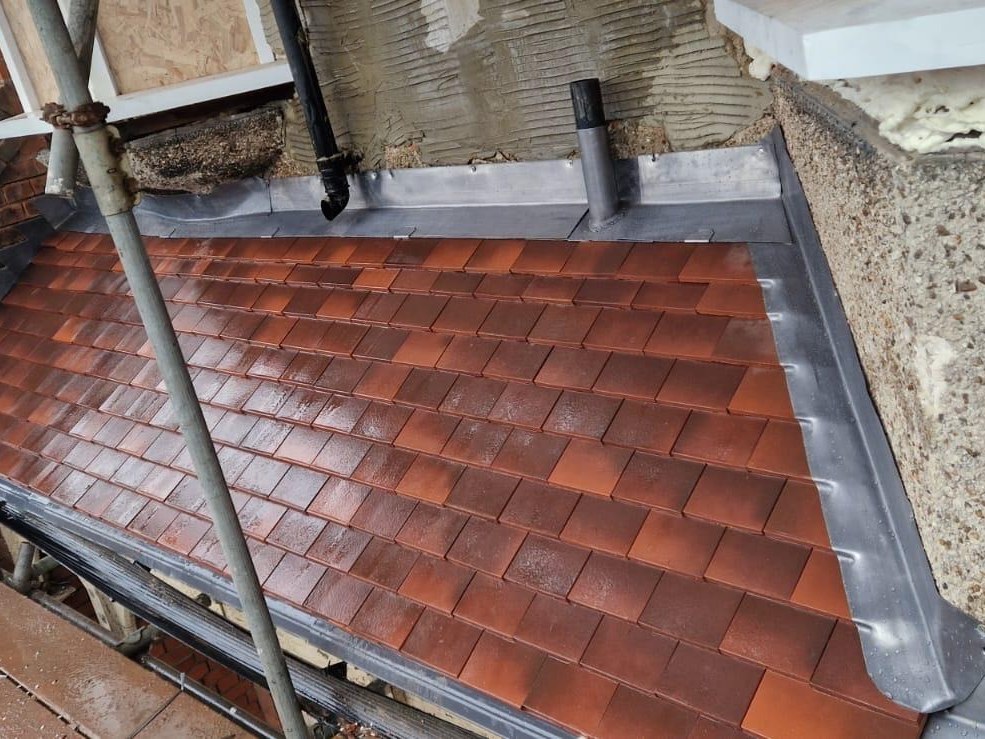 New lead flashing to a roof abutment by Harding & Co. Roofing Specialists in London and the South East — project 13
